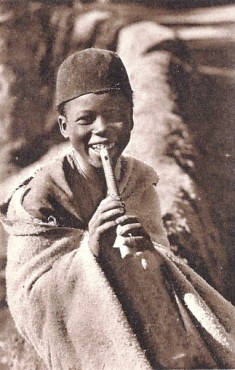 Featured is a postcard image of a smiling young boy "Joueur de Flute" (playing the flute). Looks like a wooden recorder ... which makes it the perfect woodwind instrument (and kept me from having to decide between pictures of flutes, clarinets, saxophones, etc!).  The original 
c 1920 unused postcard is for sale in The unltd.com Store.  